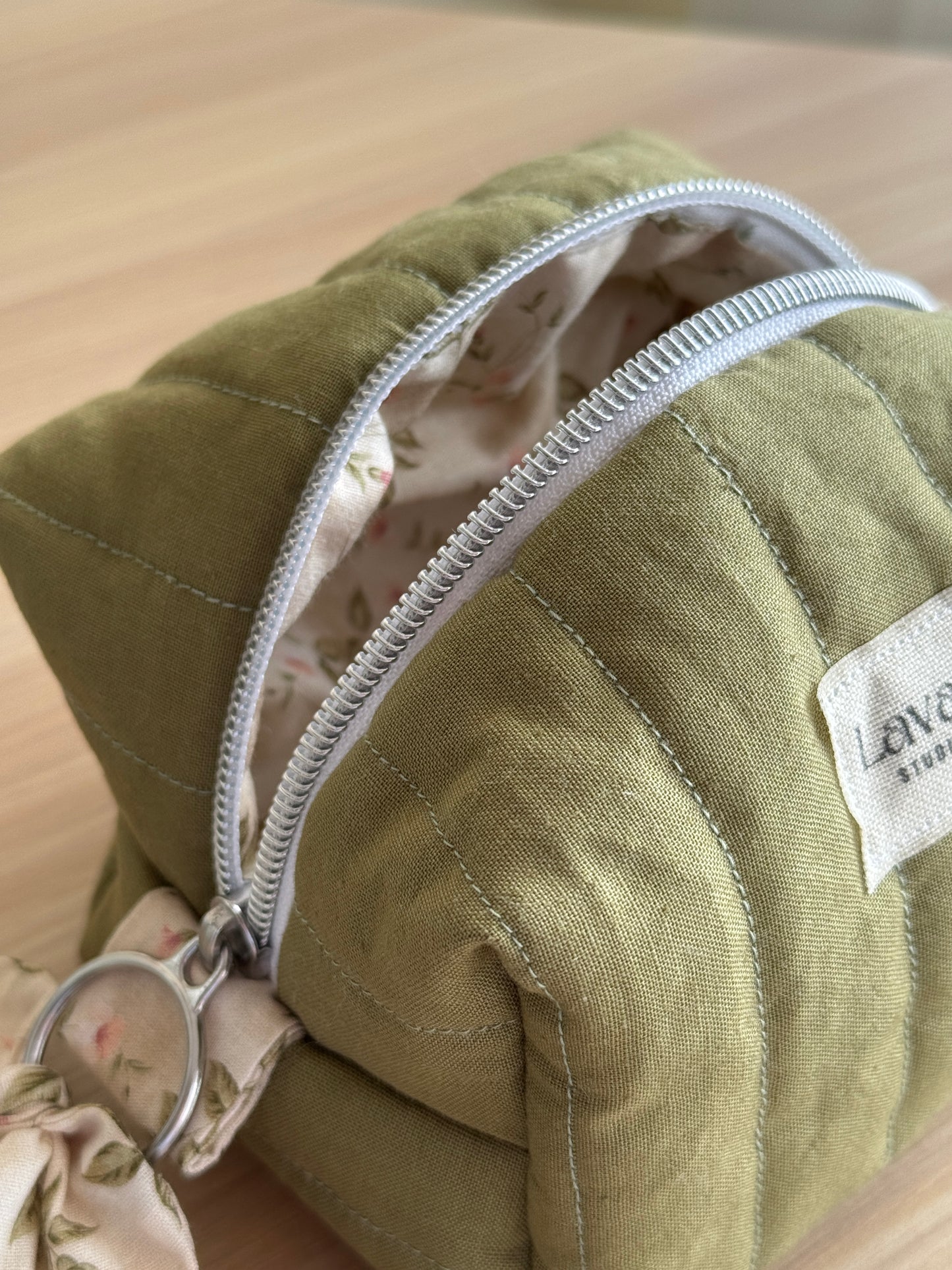 d.Mini green lirio,cosmetic bag.