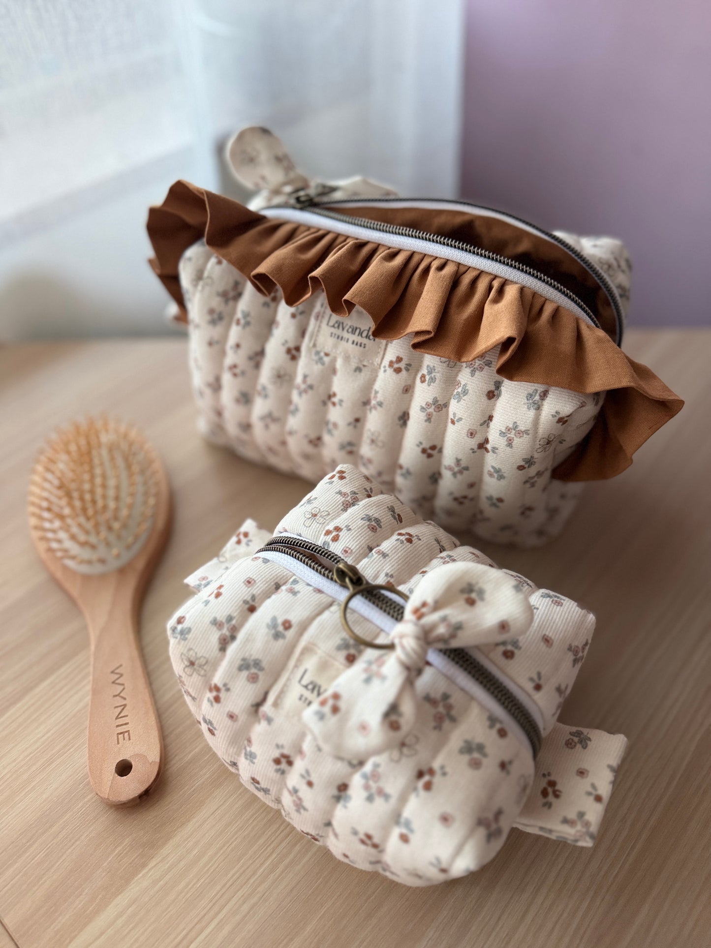 Fresia cosmetic bag coffe and flowers with ruffle.