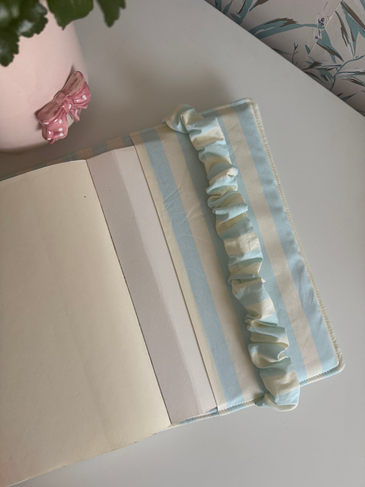 Book cover with flaps strap mint and butter