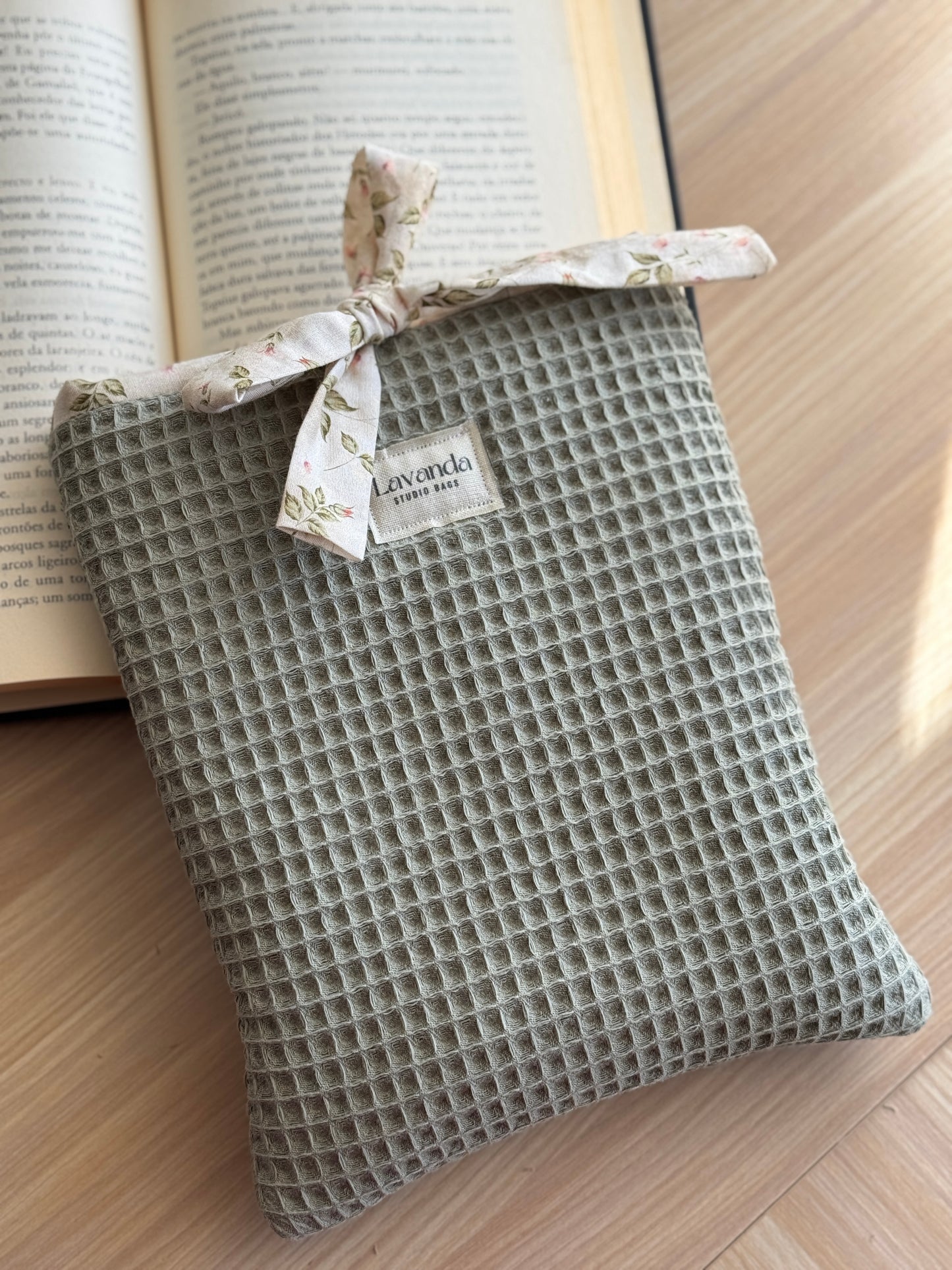 Book cover green waffle and floral pattern. With ribbon.