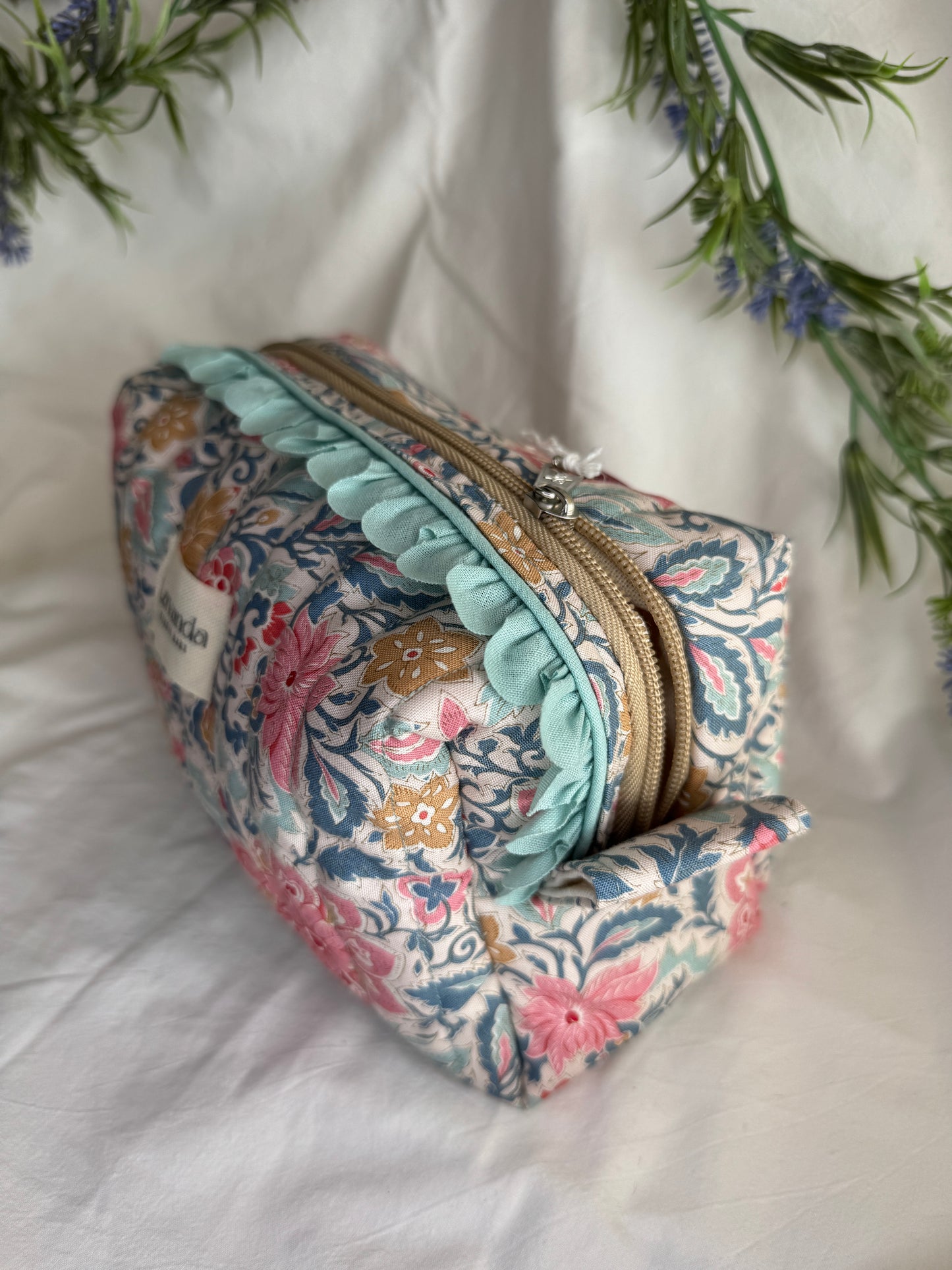 a.Cosmetic bag lilium, floral fabric.