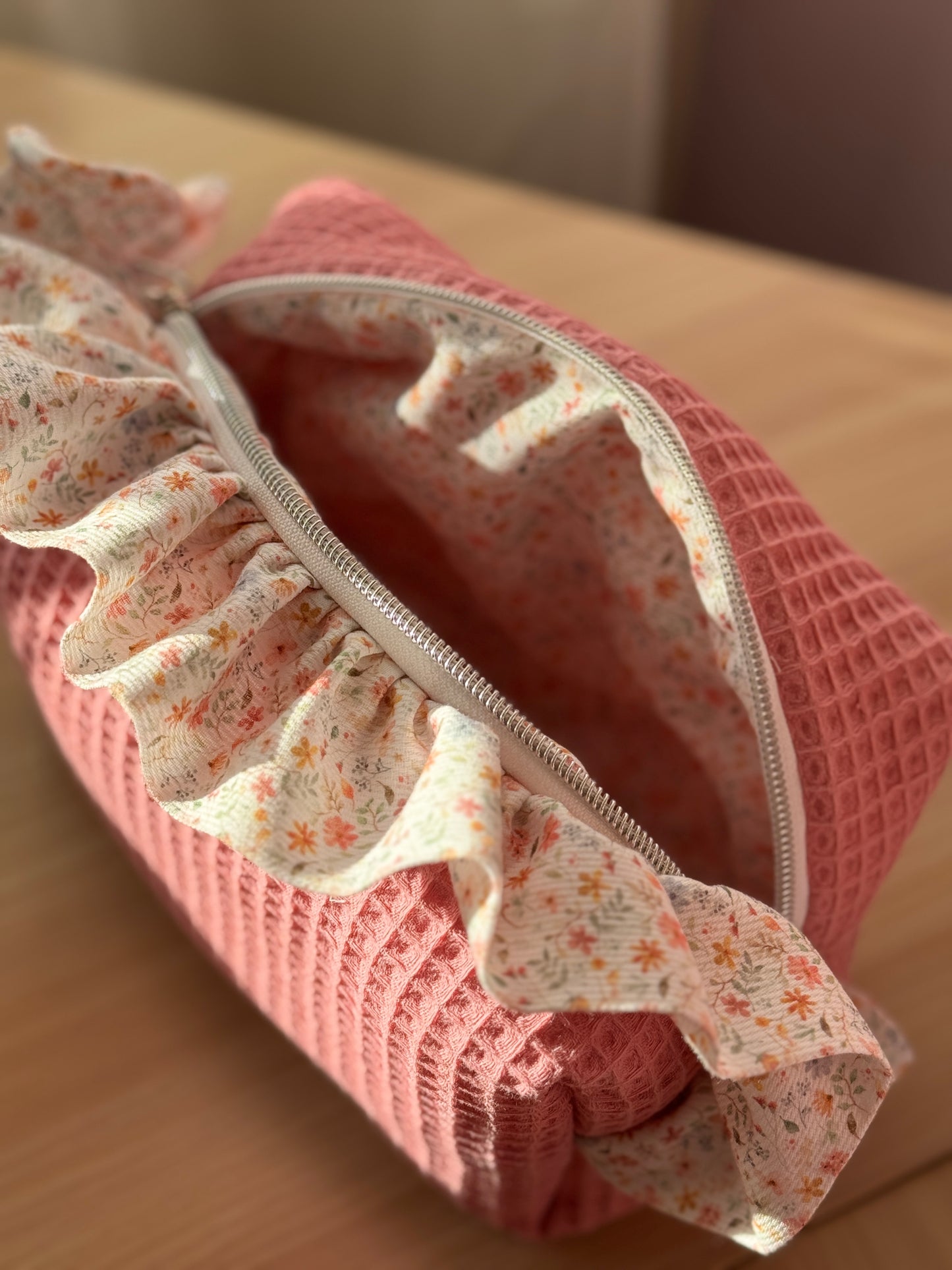 a.Cosmetic bag fresia pink light waffle and mini flowers.