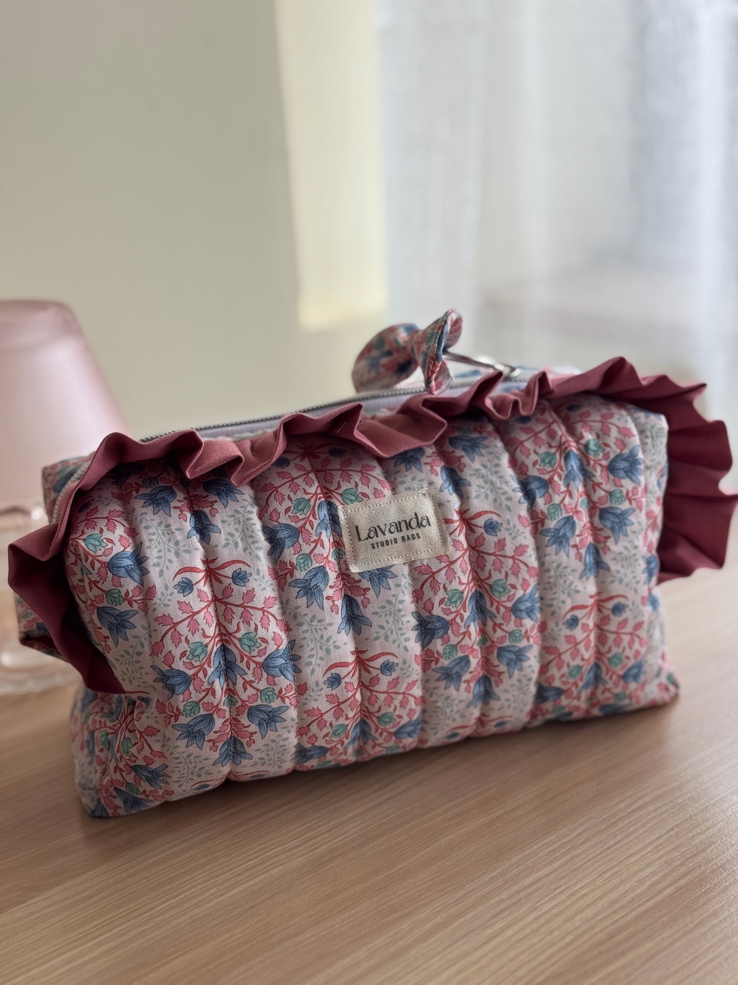 Cosmetic bag blue breeze and pink colour.