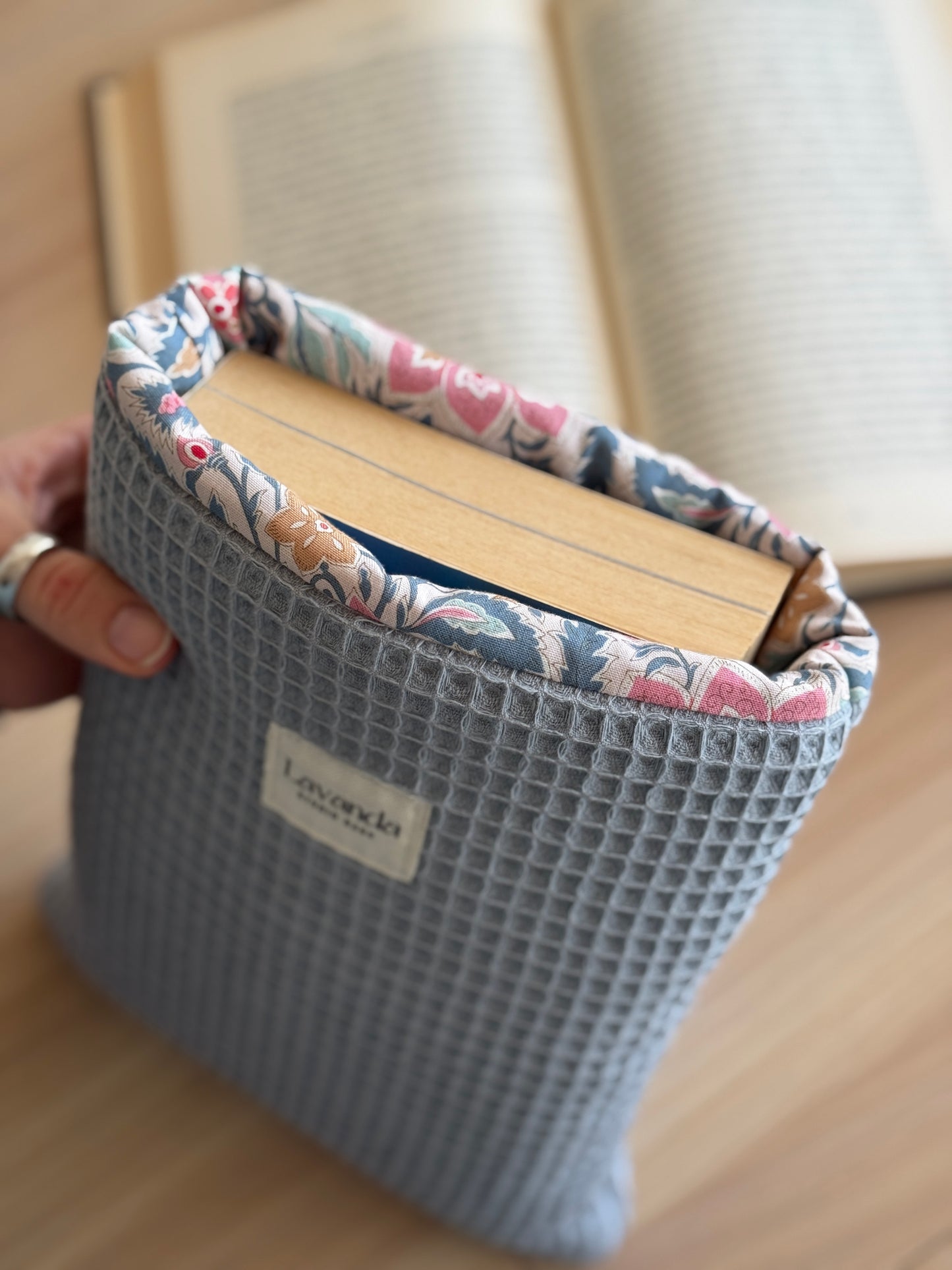 Book cover blue waffle and floral pattern. With ribbon.