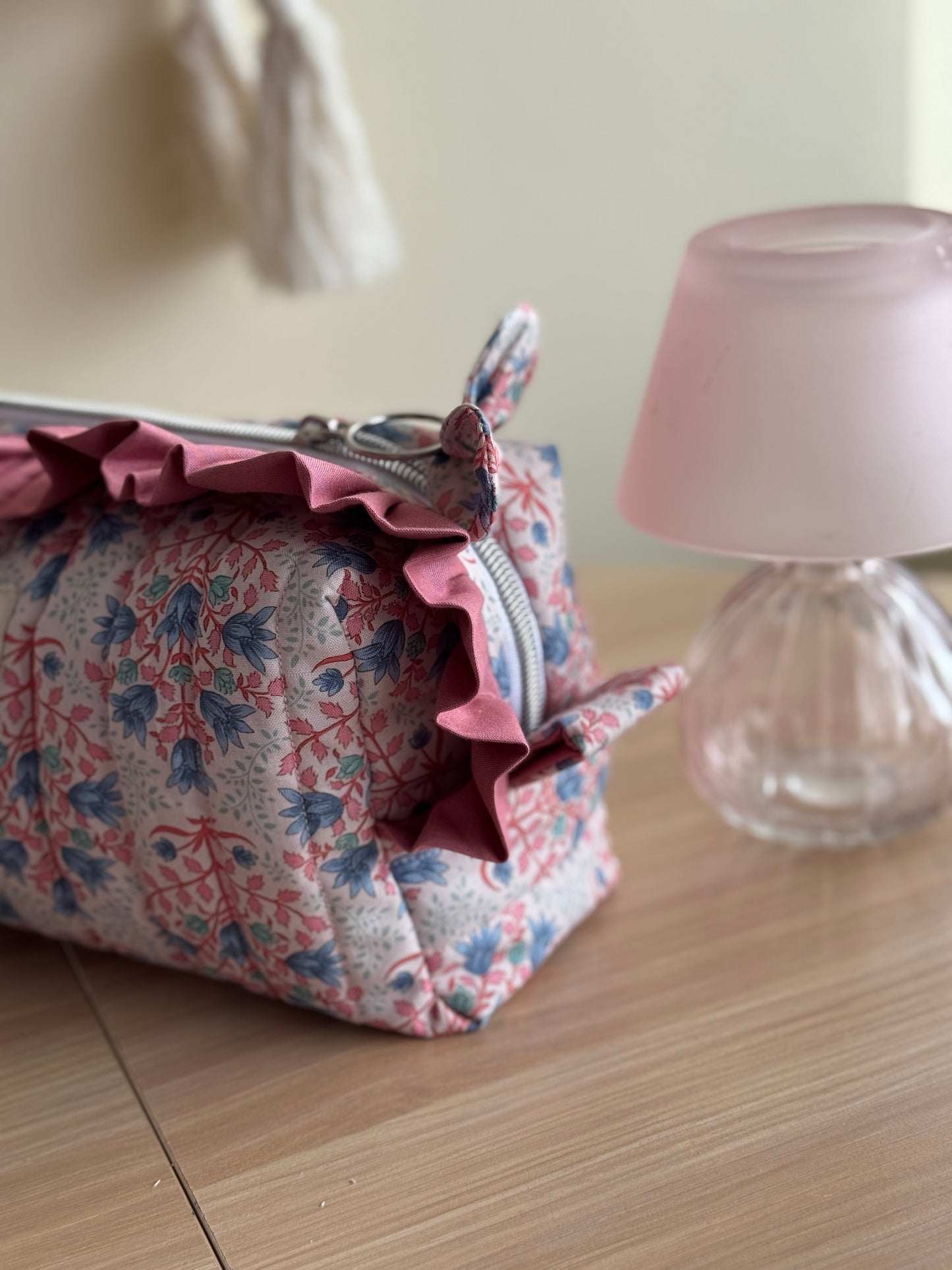 Cosmetic bag blue breeze and pink colour.