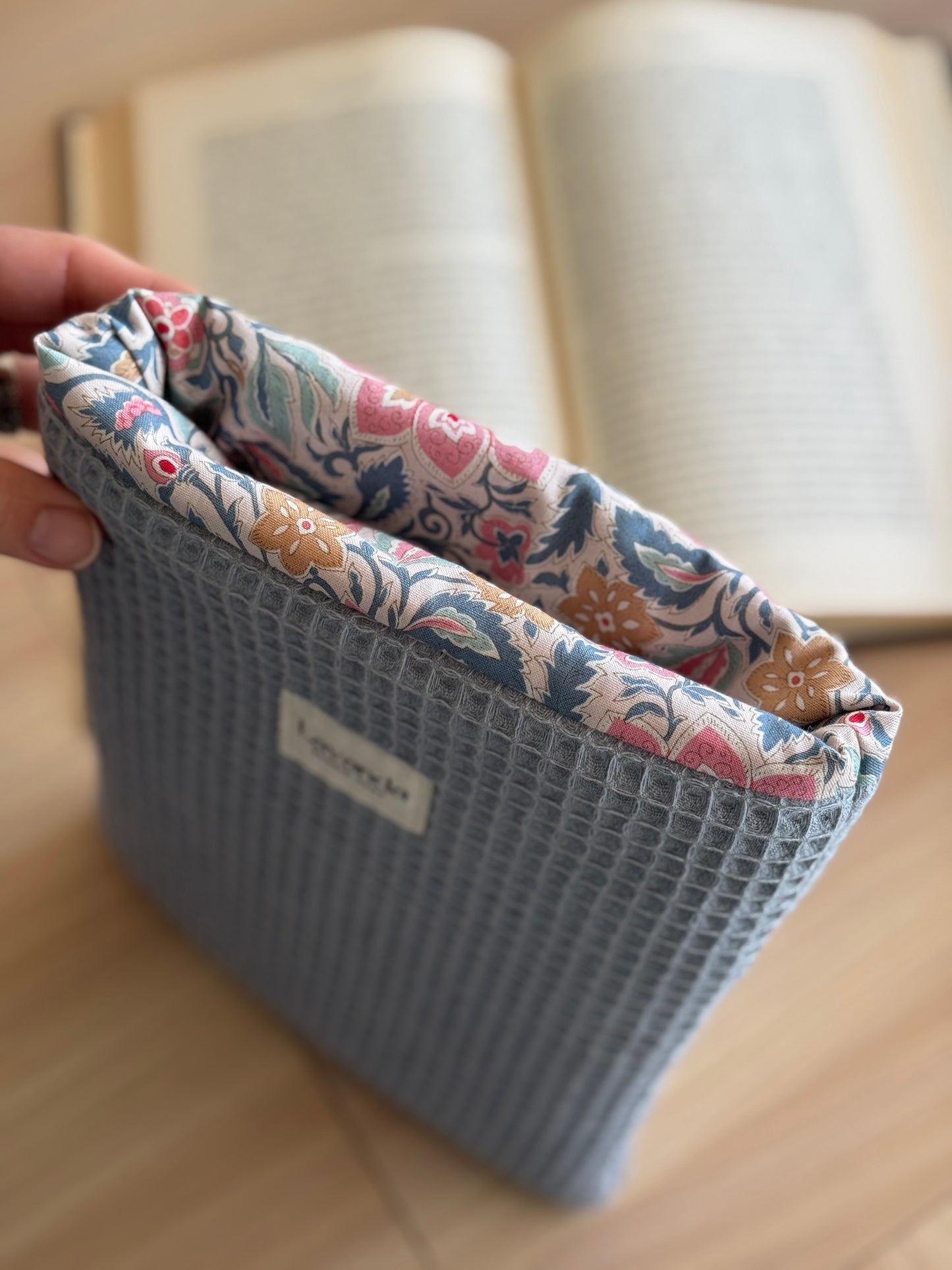 Book cover blue waffle and floral pattern. With ribbon.