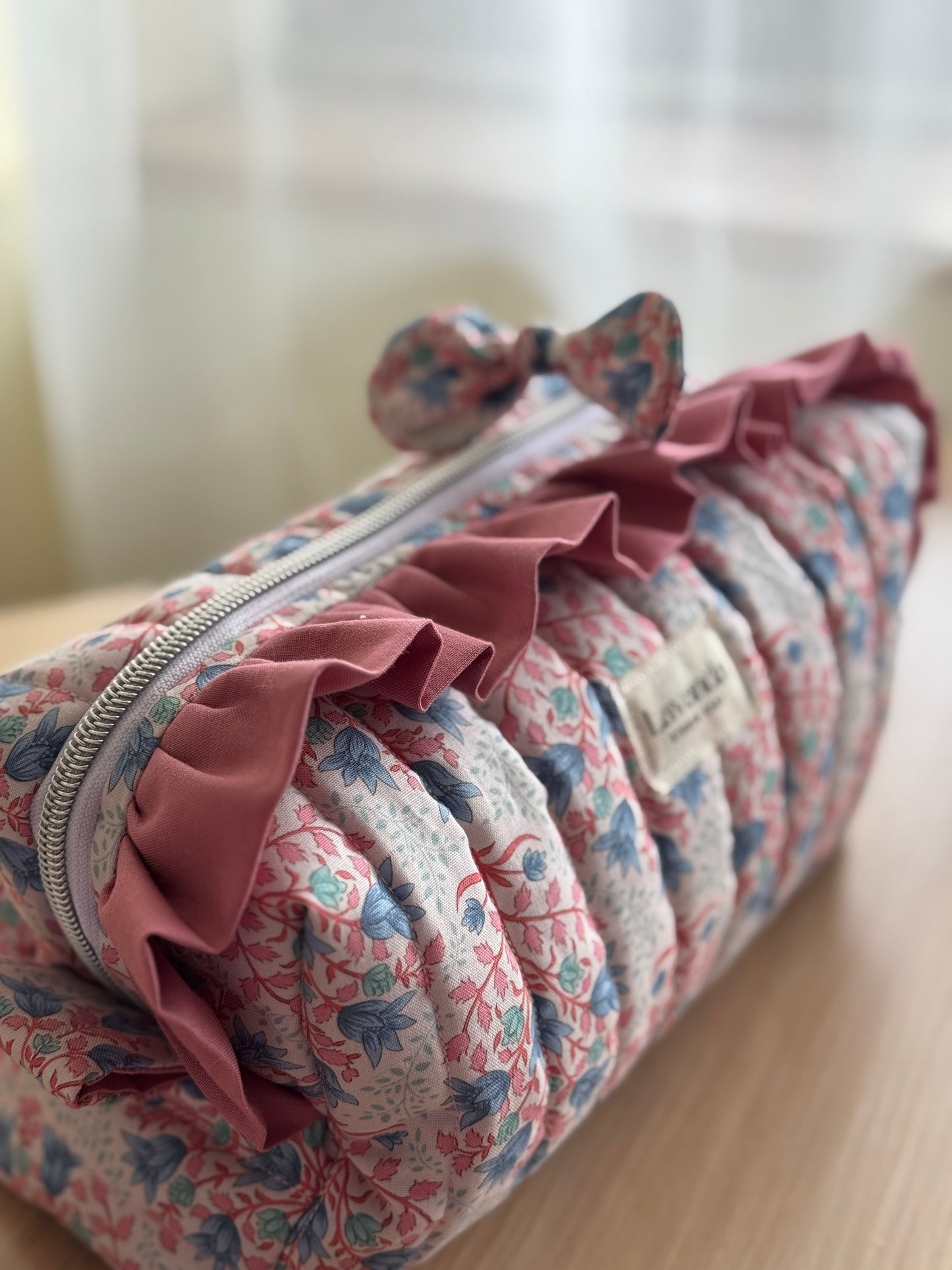 Cosmetic bag blue breeze and pink colour.