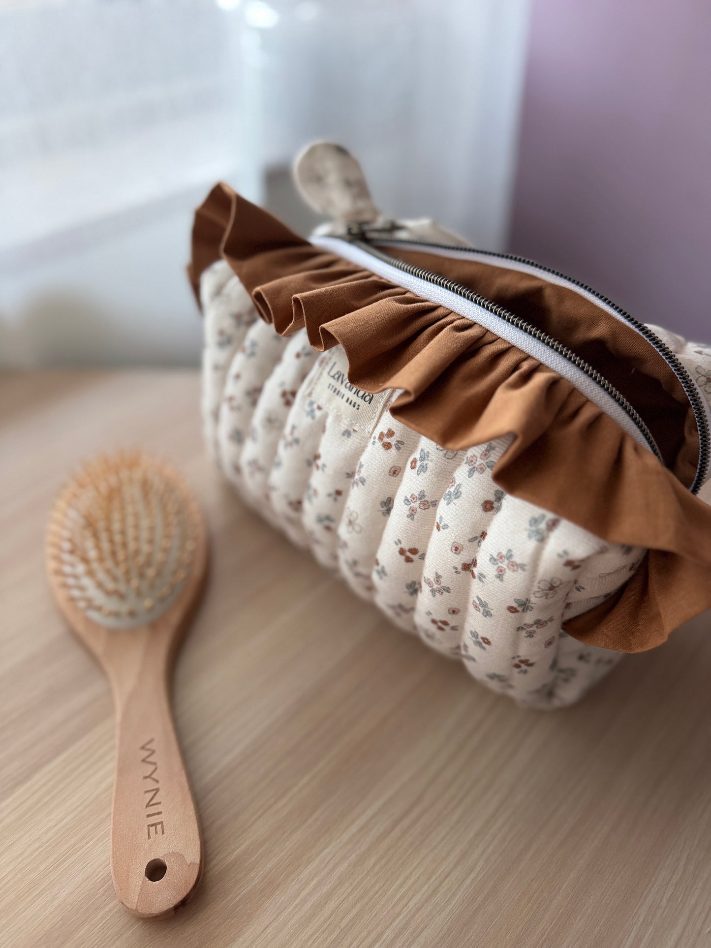 Fresia cosmetic bag coffe and flowers with ruffle.