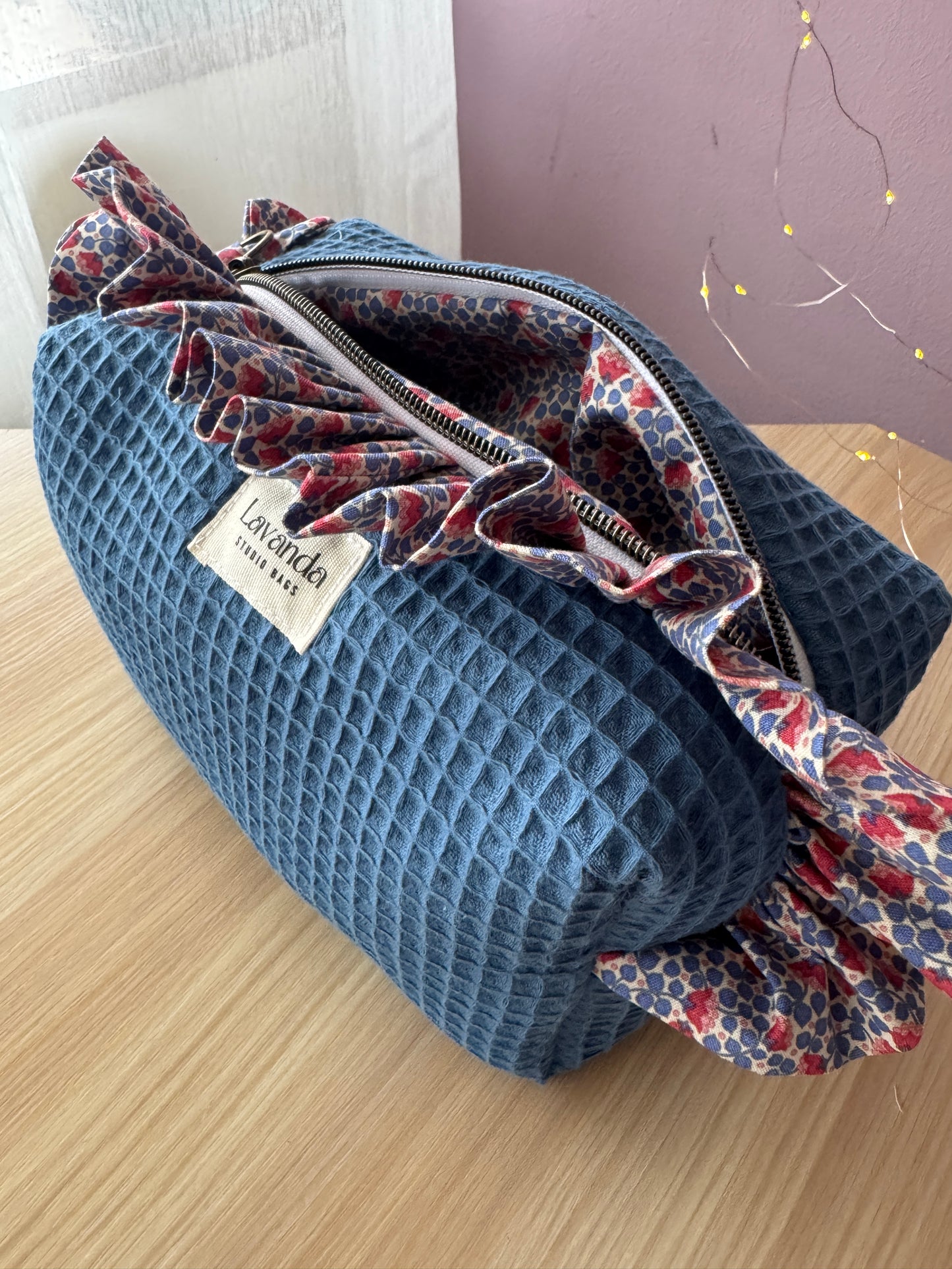 a.Cosmetic bag fresia blue waffle and mini flowers.