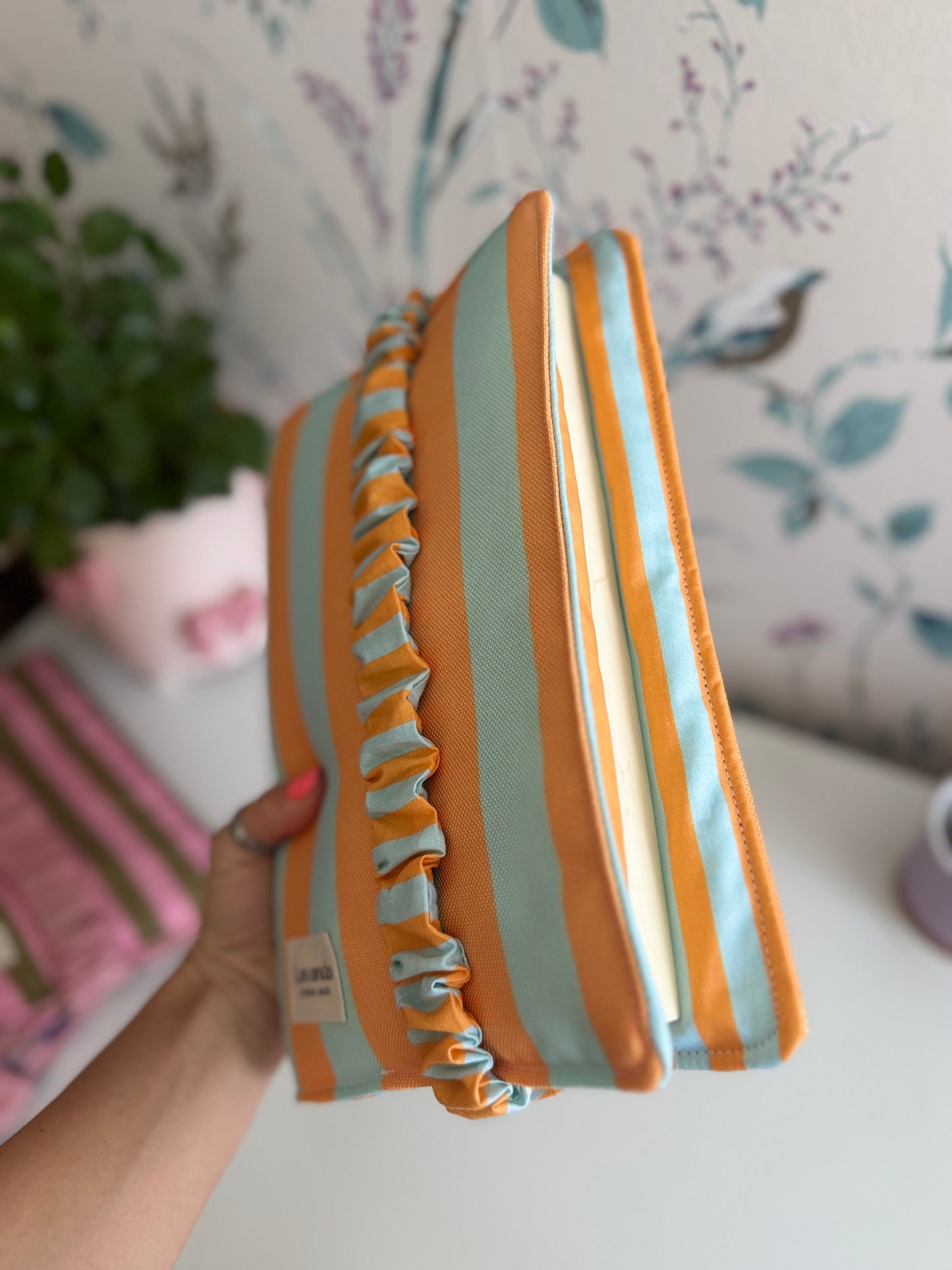 Book cover with flaps strap mint and orange