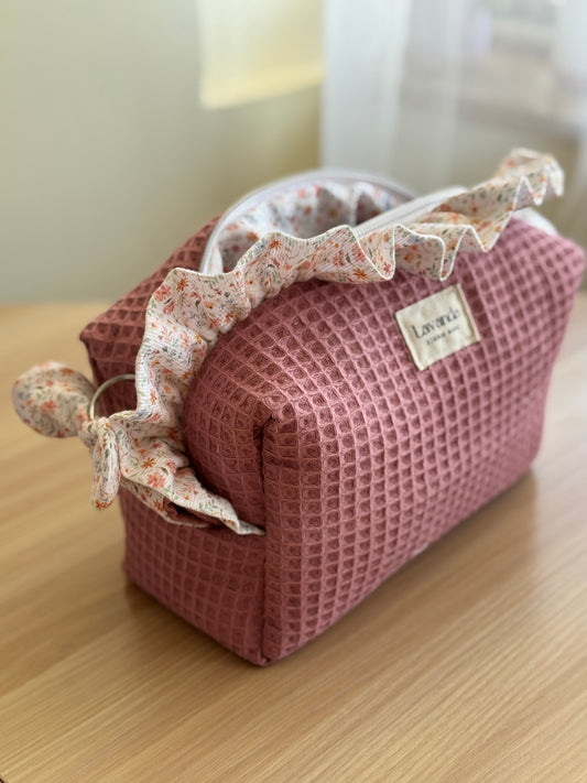 a.Cosmetic bag fresia pink waffle and mini flowers.