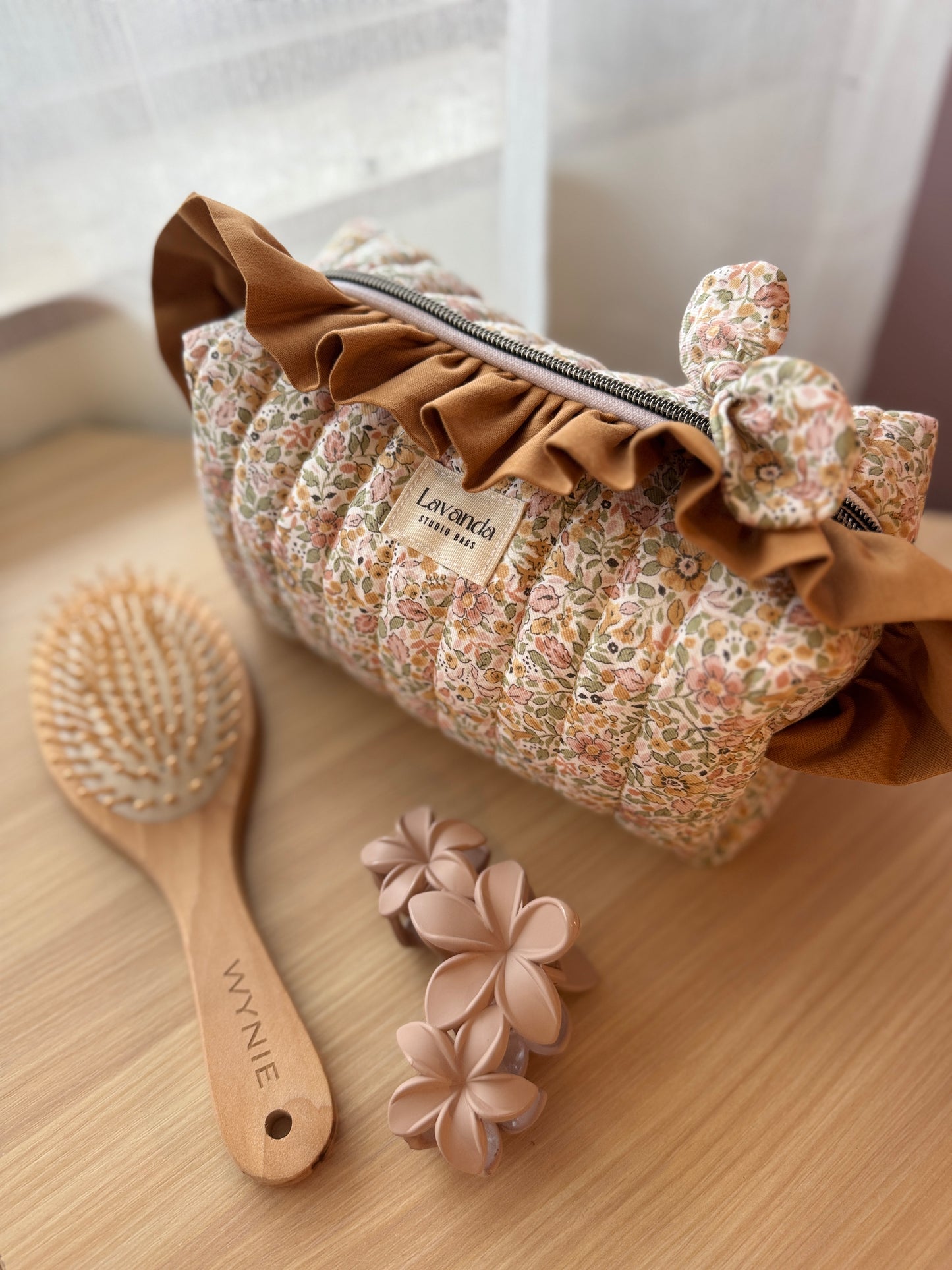 Fresia cosmetic bag coffe and flowers with ruffle.