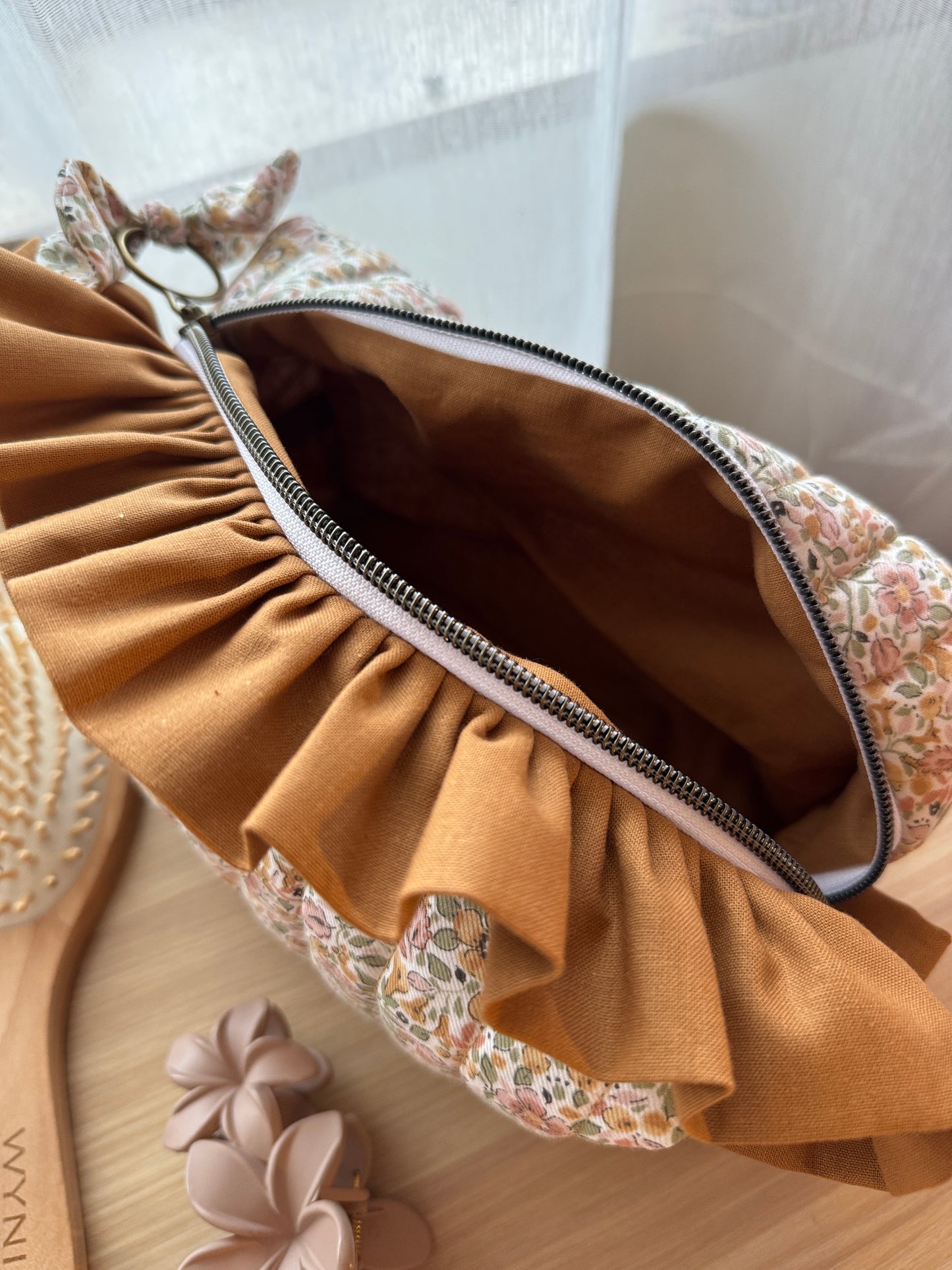 Fresia cosmetic bag coffe and flowers with ruffle.