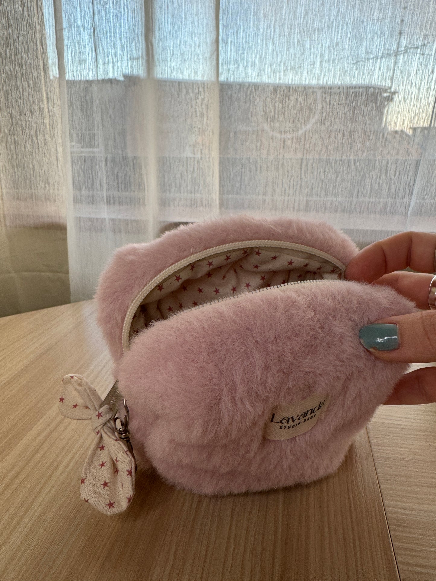 Mini pink fluffy cosmetic bag