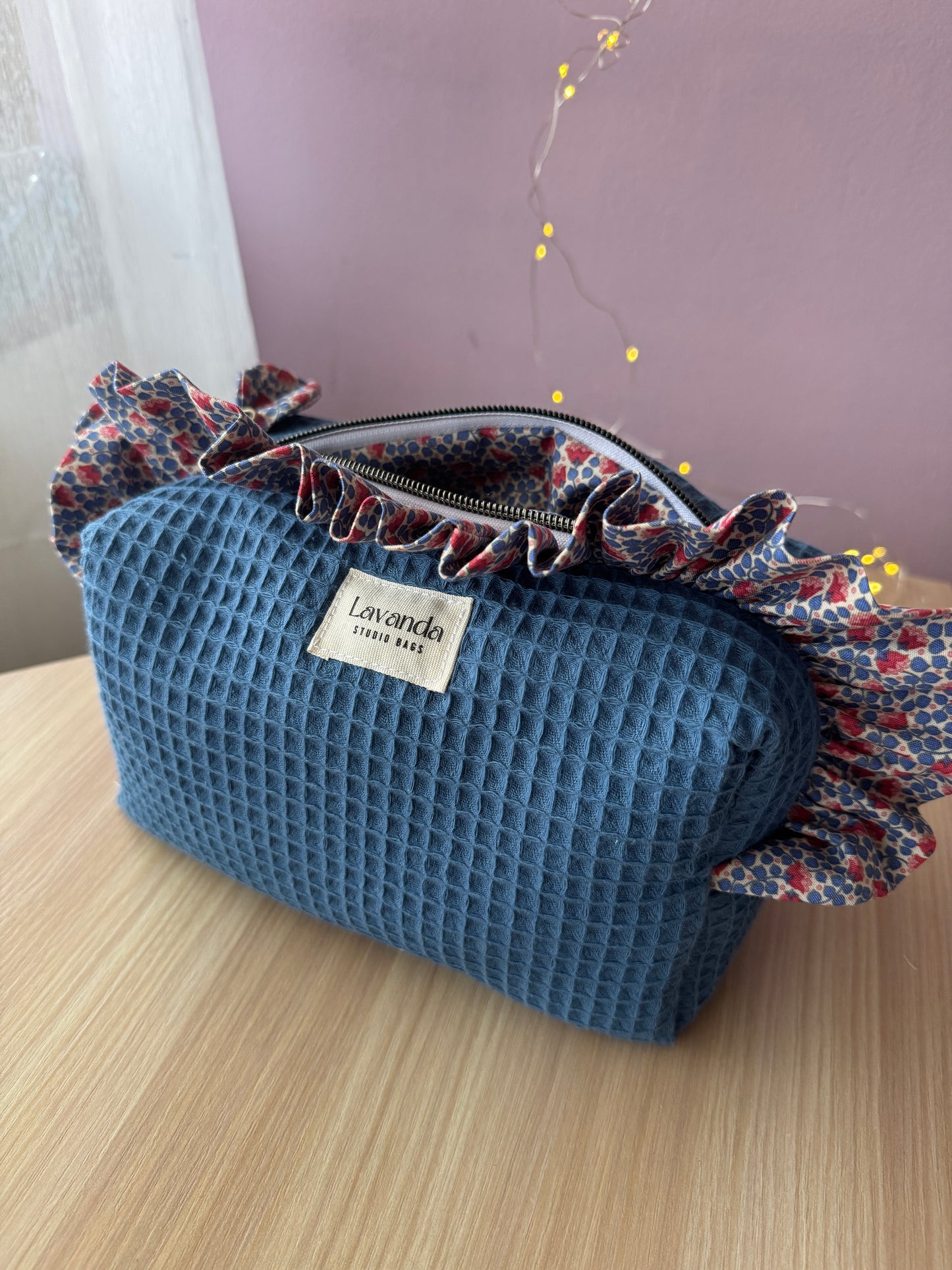 a.Cosmetic bag fresia blue waffle and mini flowers.