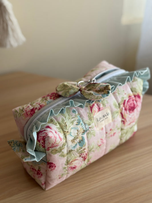a.Cosmetic bag floral and ruffle. “garden of memories”