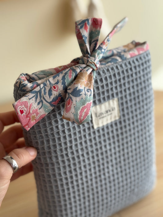 Book cover blue waffle and floral pattern. With ribbon.