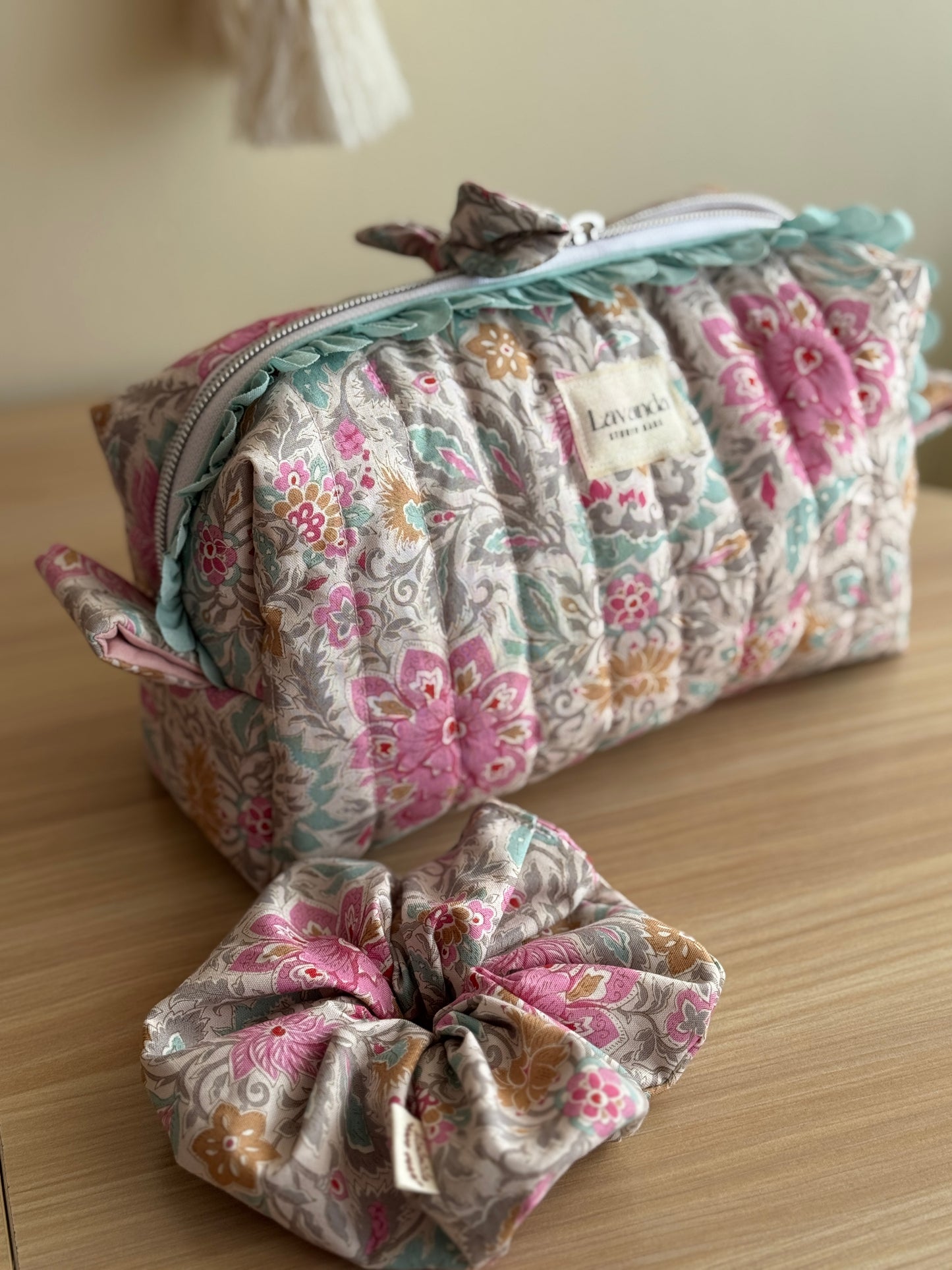 a.Cosmetic bag lilium, floral fabric.