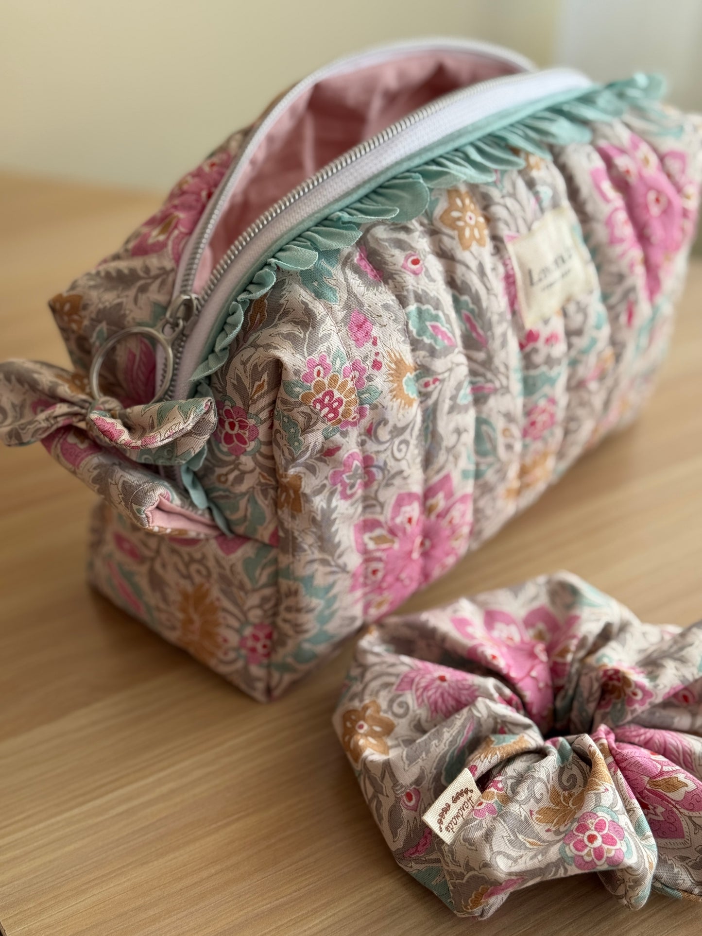 a.Cosmetic bag lilium, floral fabric.