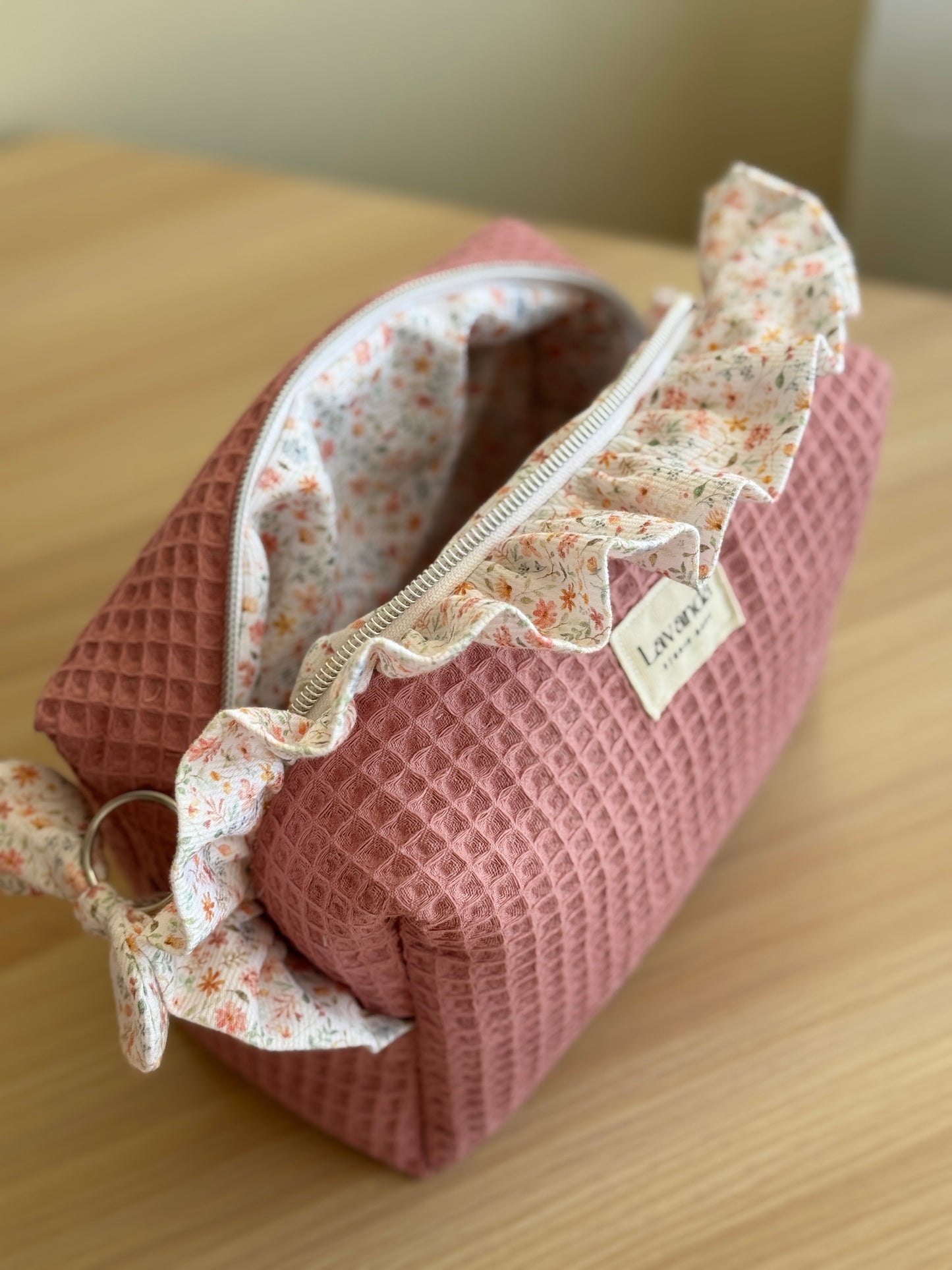 a.Cosmetic bag fresia pink waffle and mini flowers.