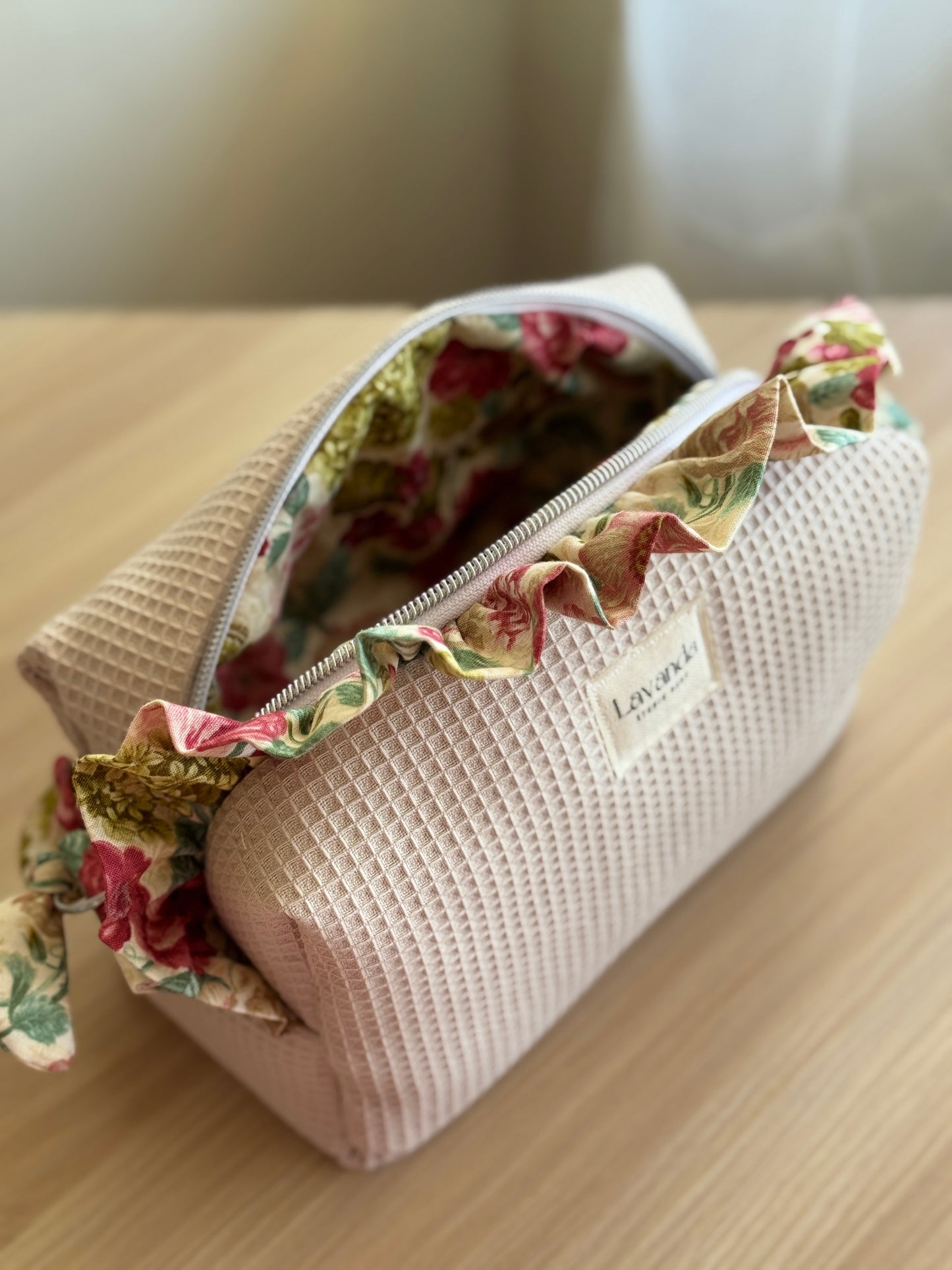 a.Cosmetic bag fresia beige waffle flowers.