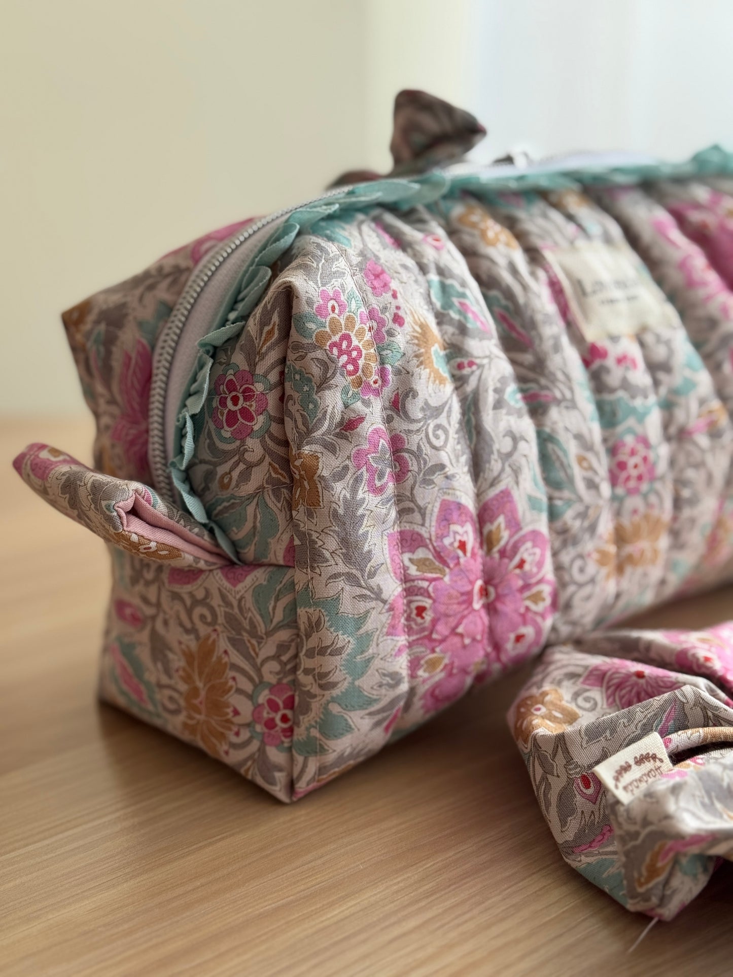 a.Cosmetic bag lilium, floral fabric.