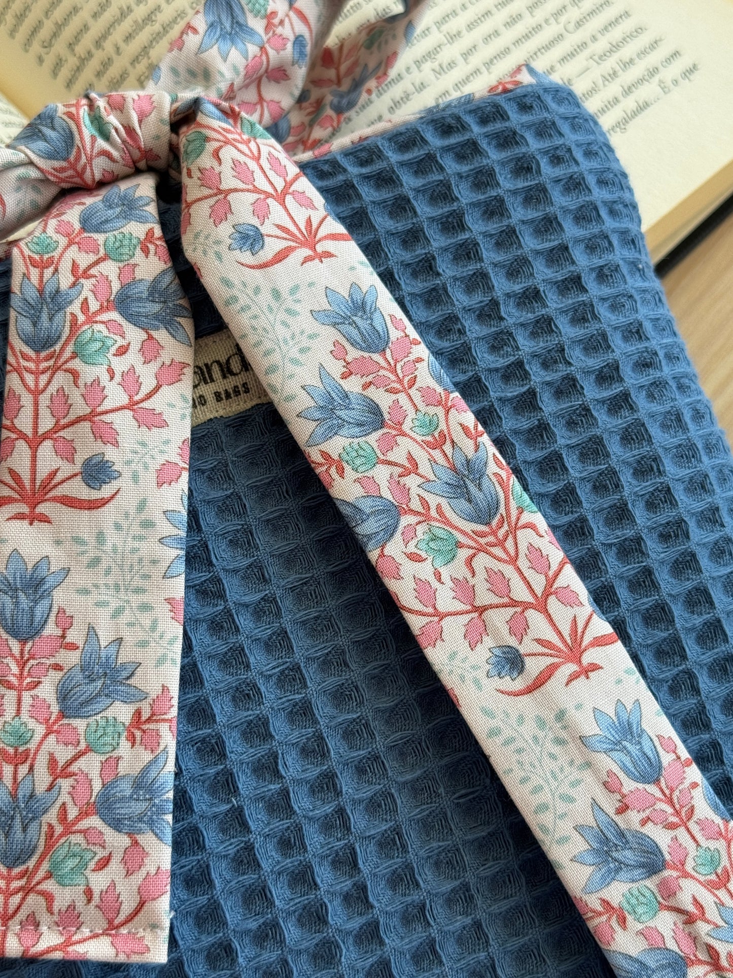 Book cover blue waffle and floral pattern.