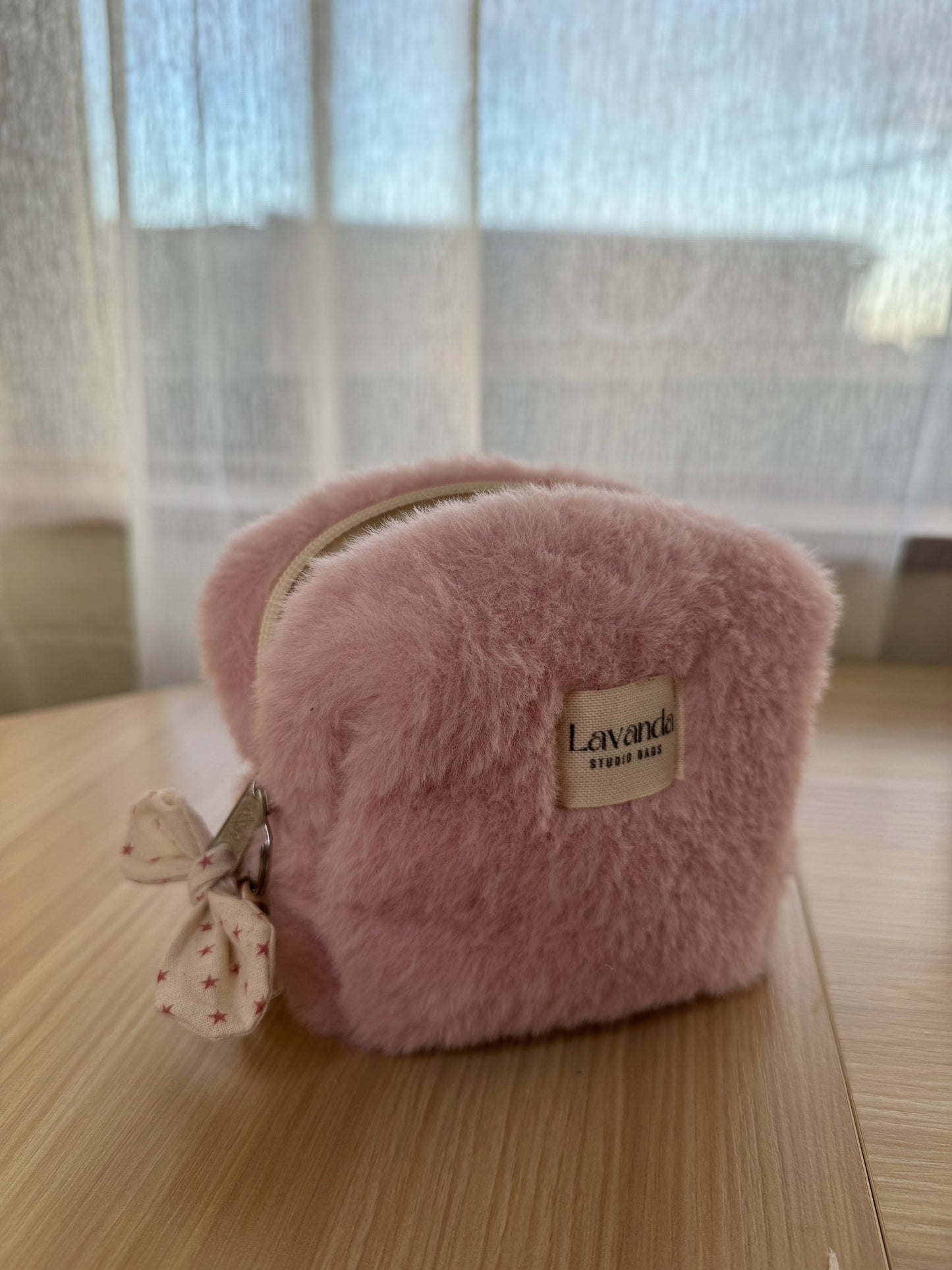 Mini pink fluffy cosmetic bag