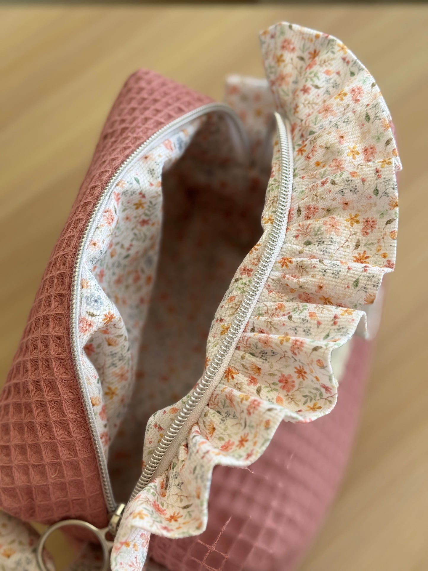 a.Cosmetic bag fresia pink waffle and mini flowers.