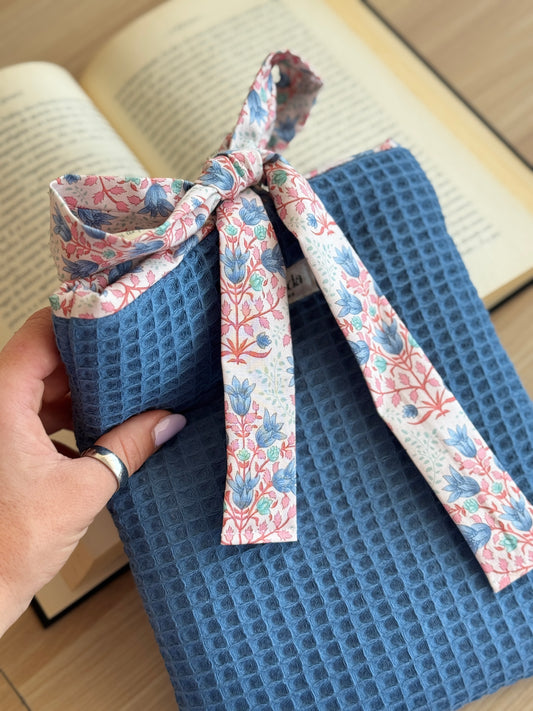 Book cover blue waffle and floral pattern.