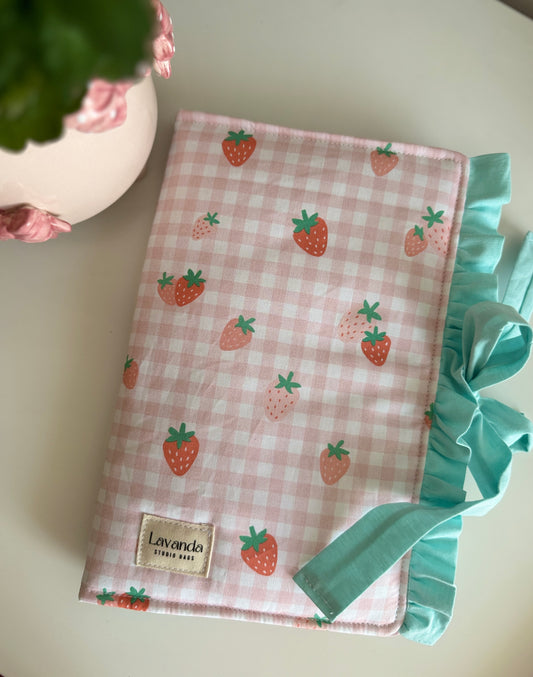 Book cover with flaps strawberry and green colour.