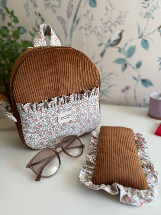 Mini backpack brawn pana and little flowers.