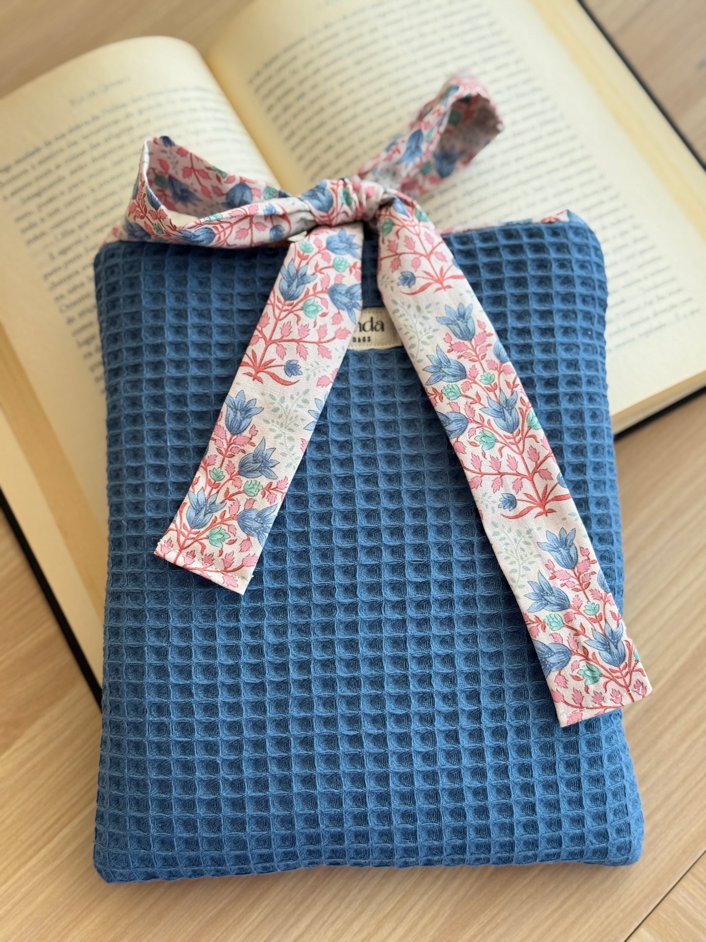 Book cover blue waffle and floral pattern.