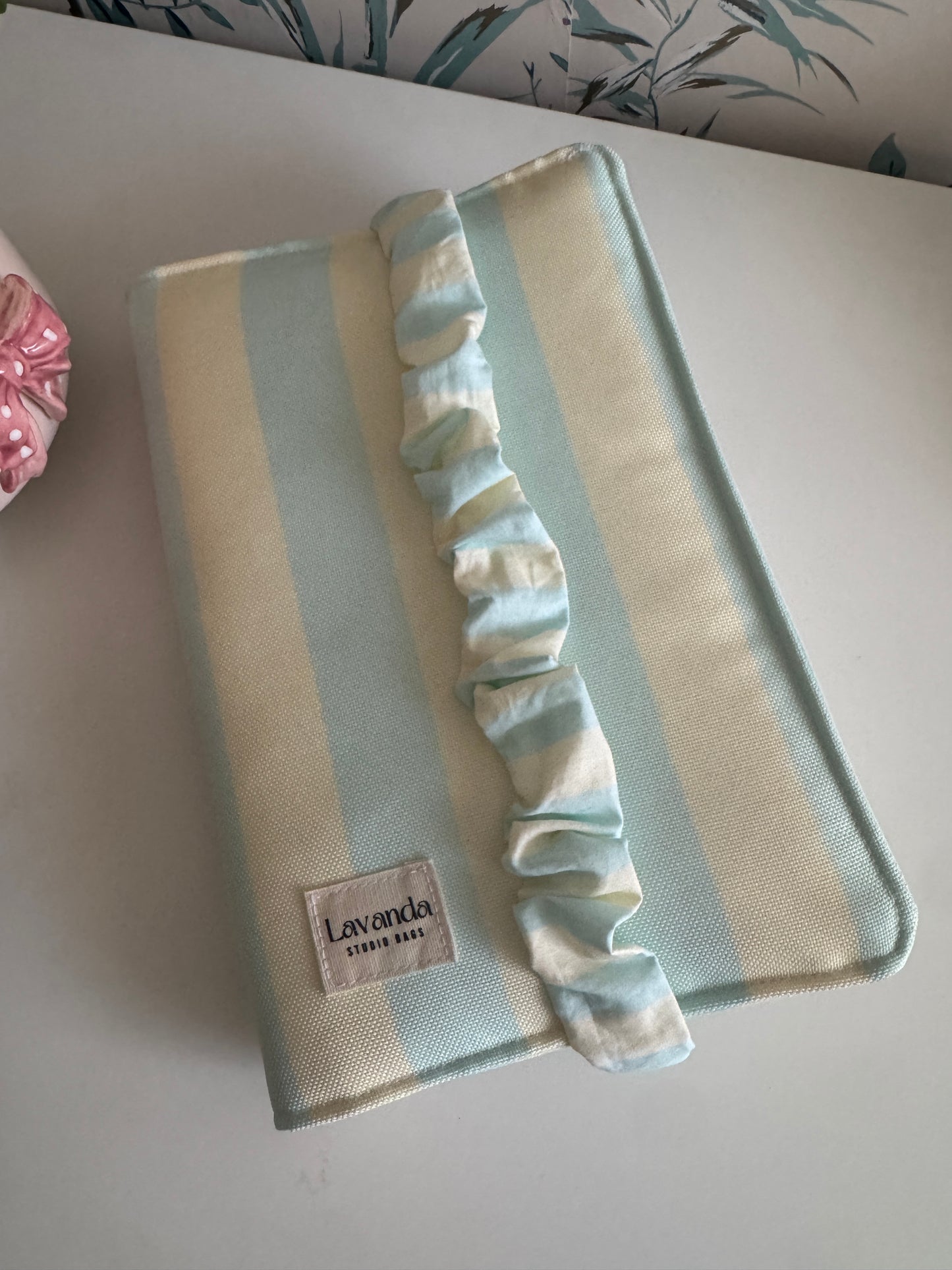 Book cover with flaps strap mint and butter