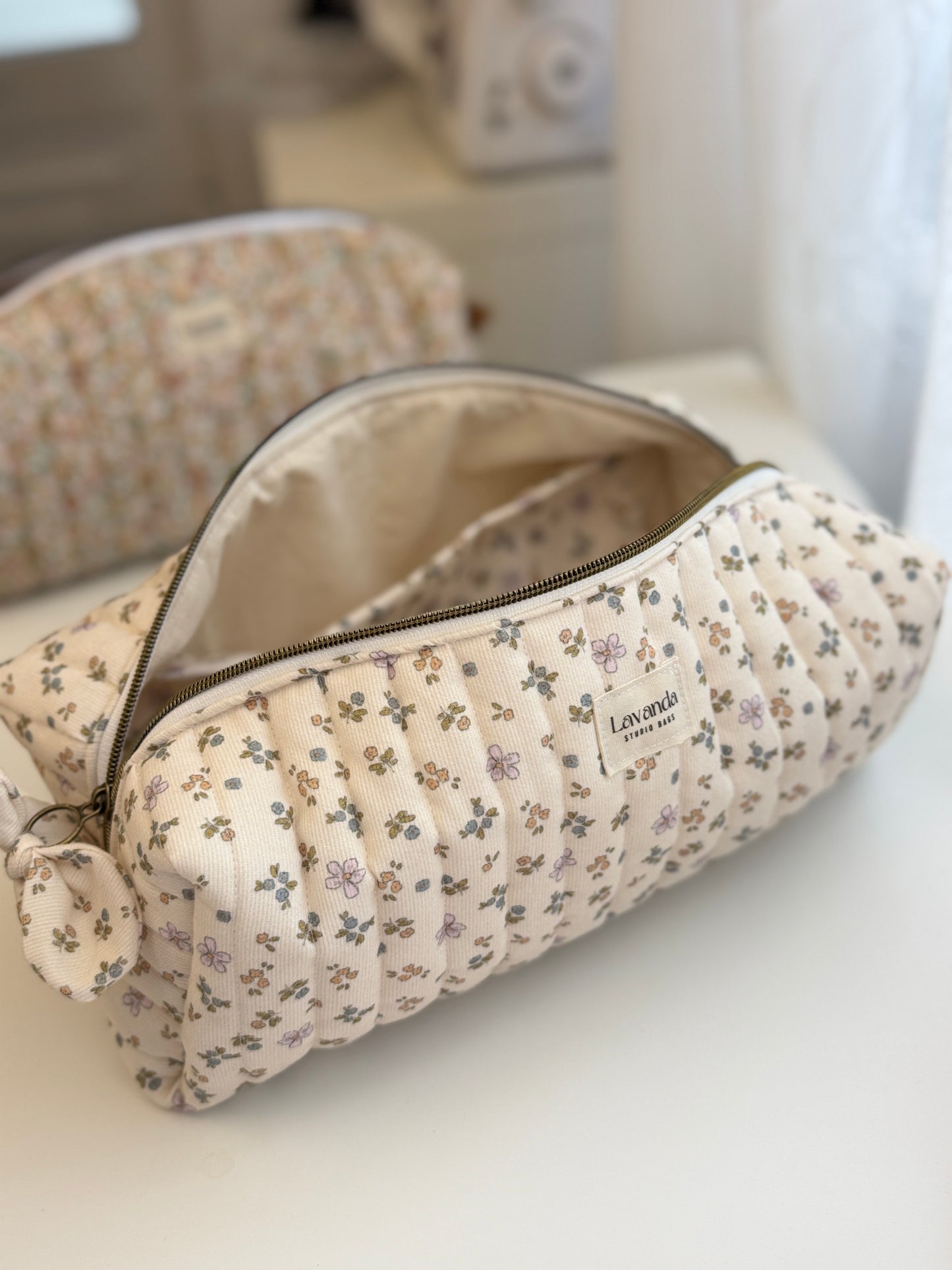 Dyson airwrap bag beige and flowers inside