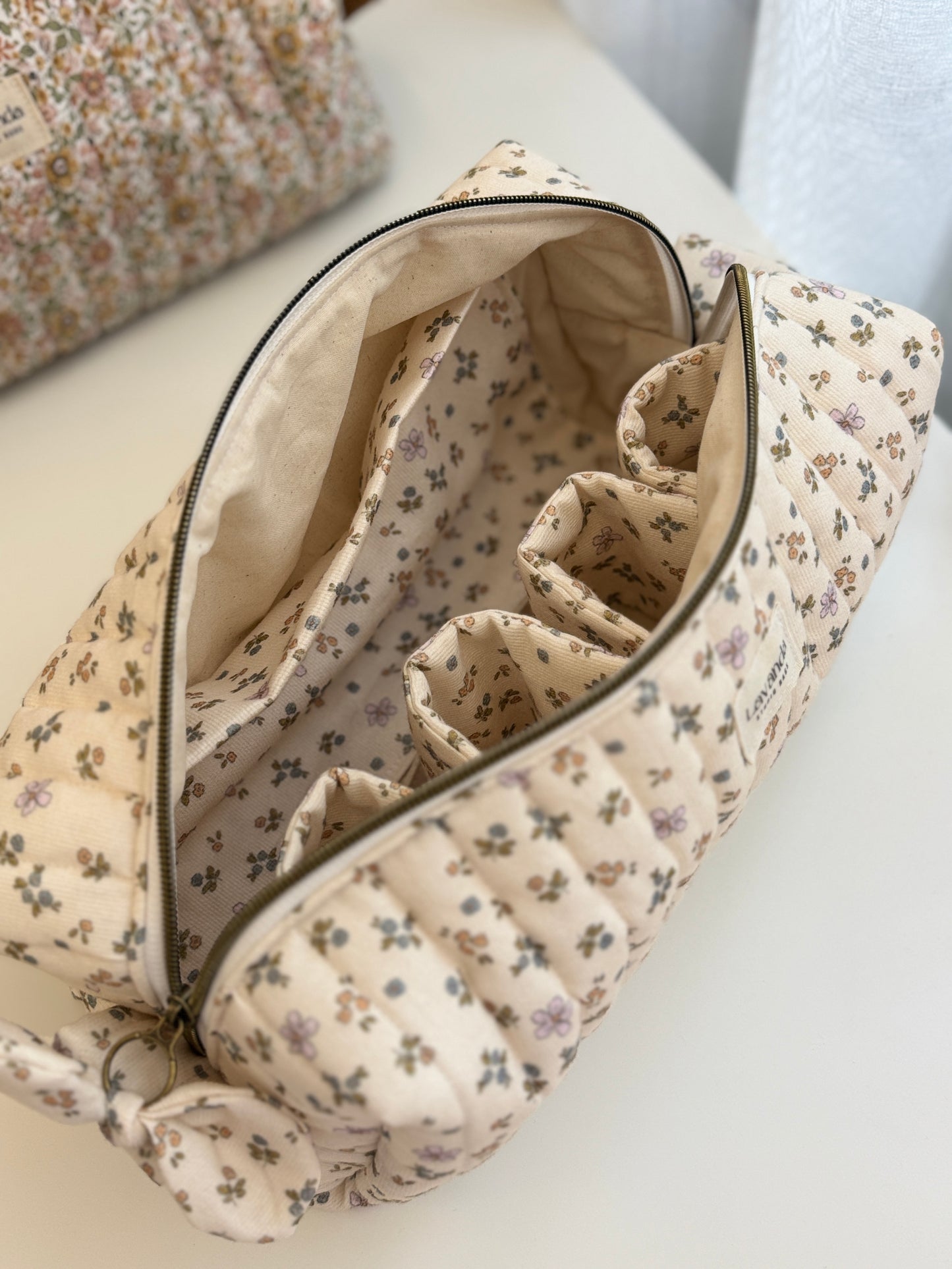 Dyson airwrap bag beige and flowers inside